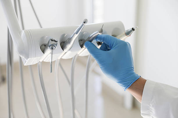 Professional Tooth Extraction technician working in Rexland Acres, CA